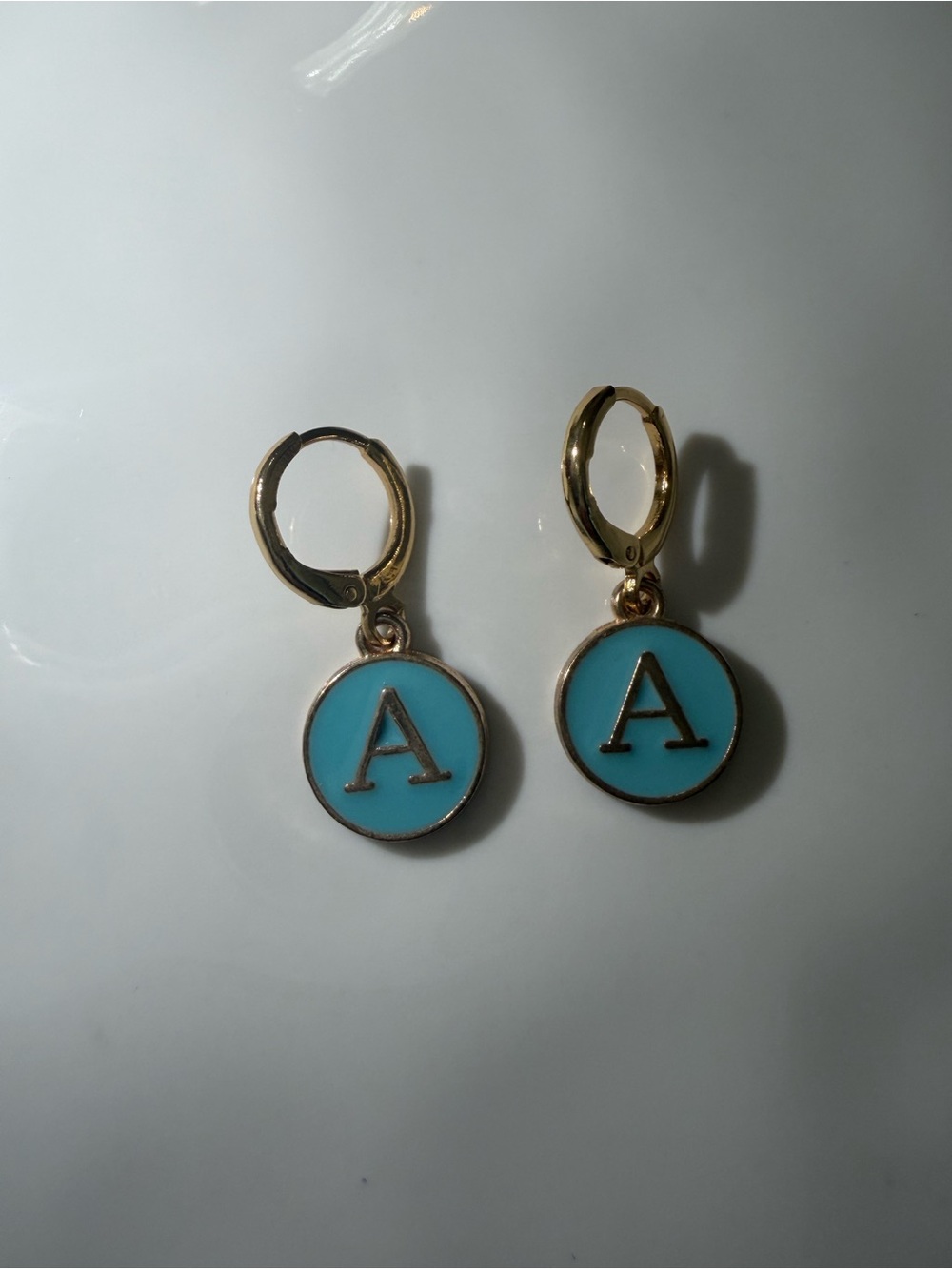 Gold Hoop Earrings with Blue "A" Charm